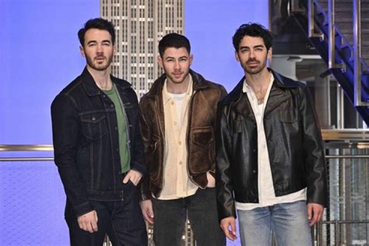 Jonas Brothers get their groove on in retro visual for ‘Only Human’